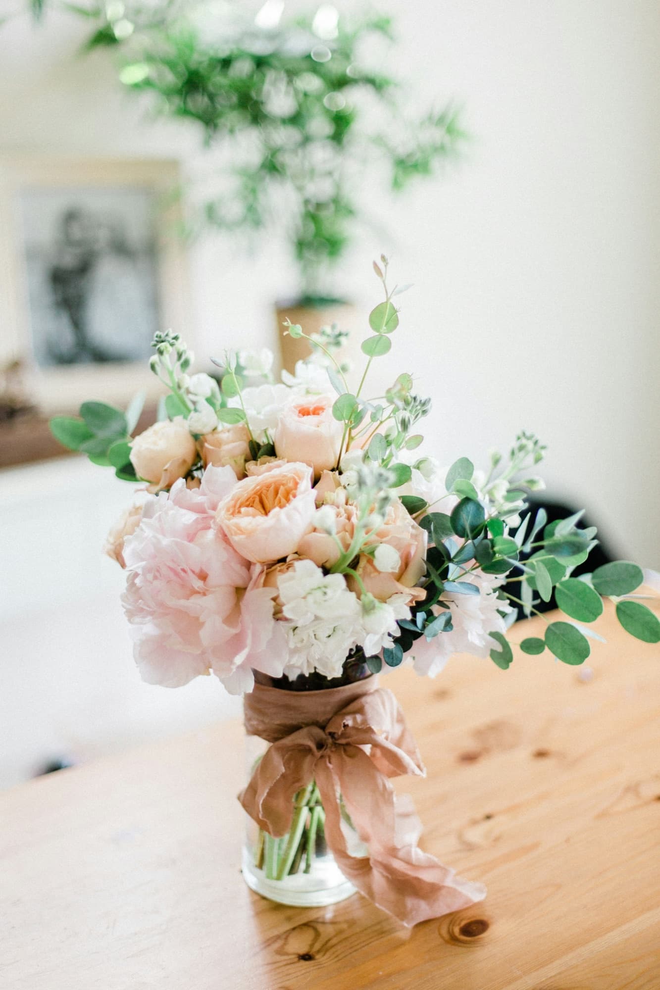 Professional florist arranging fresh flowers
